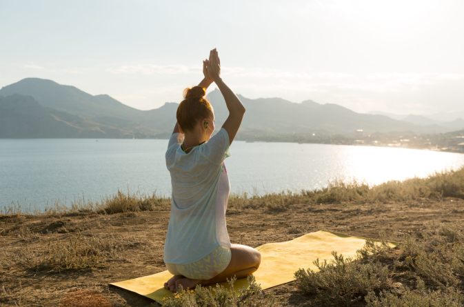 yoga-girl-with-wireless-headphones-scaled